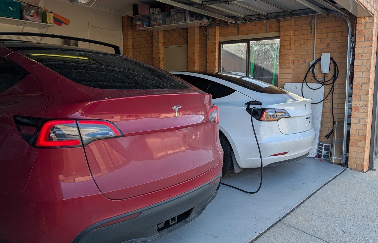 Dual Teslas charging in Gavin's garage